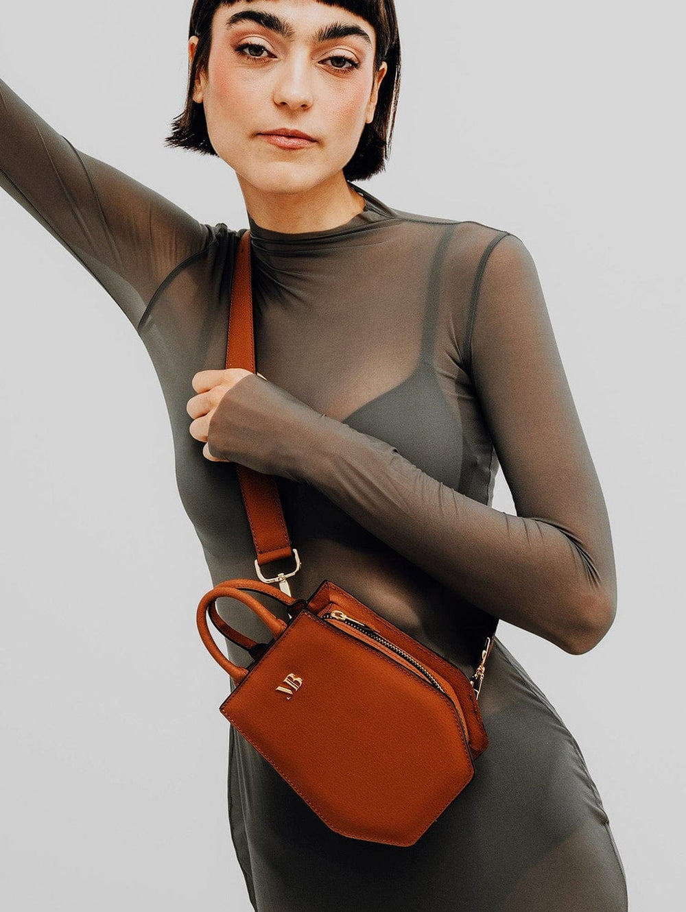 Merries メリーズ　M5パック、L2パック Mini Elay MIRUM® Leather Crossbody Bag | Cognac – Immaculate Vegan