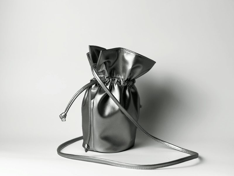 Mela Olivia Apple Leather Vegan Bucket Bag | Silver